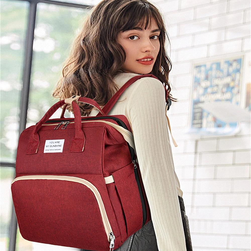 Foldable bed diaper bag with changing station - Strolli Baby