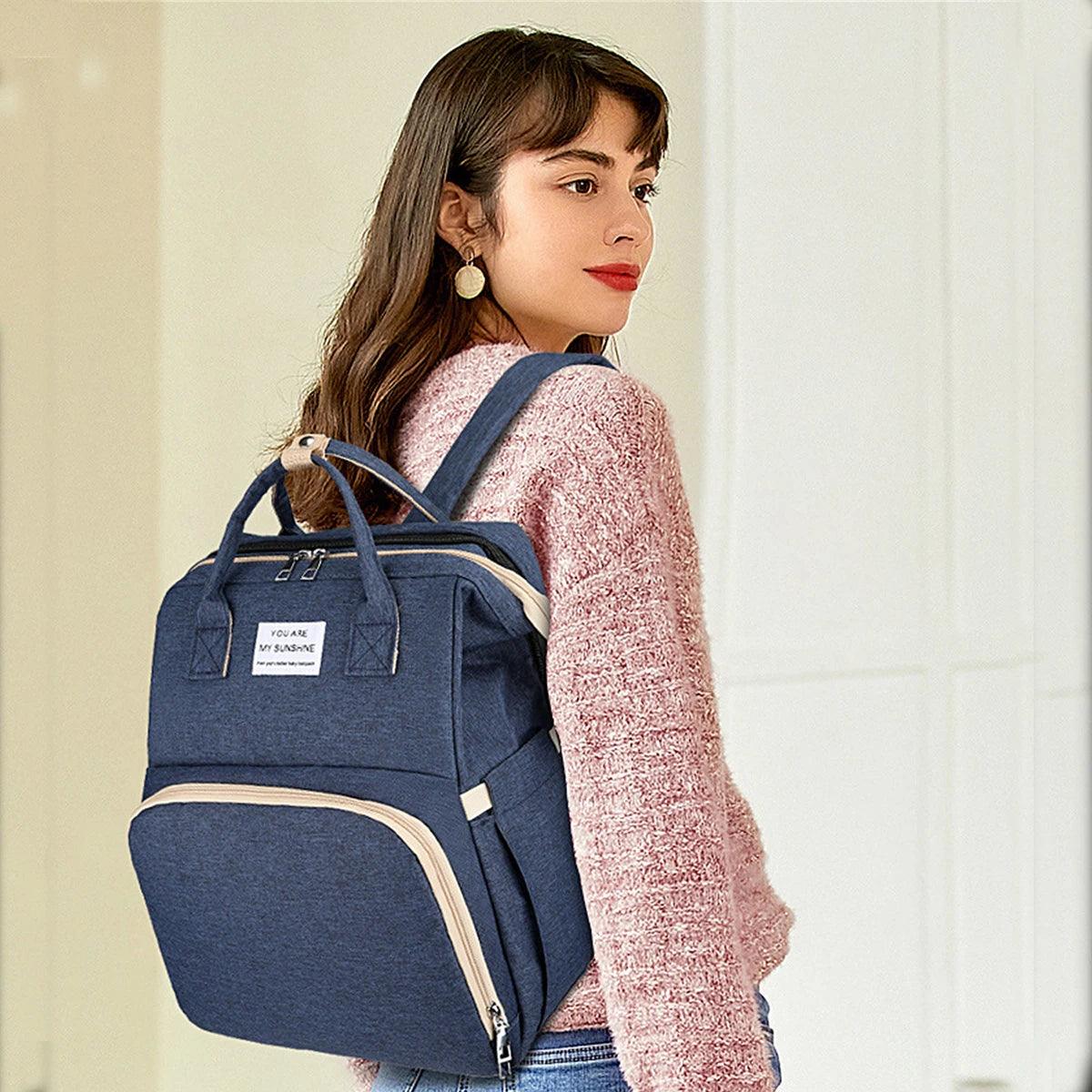 Foldable bed diaper bag with changing station - Strolli Baby